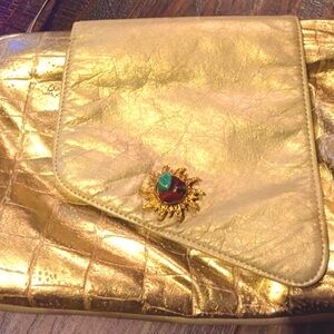 Gorgeous vintage gold leather clutch